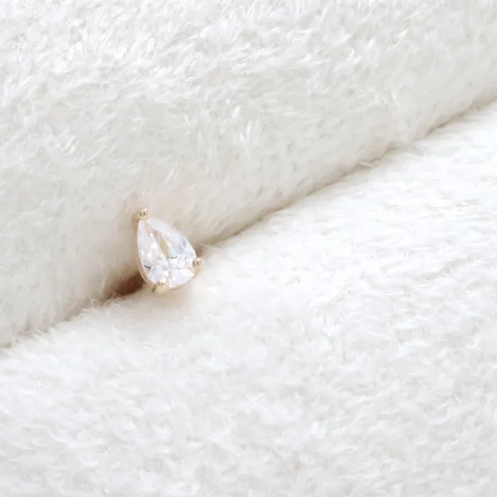 from J Shop Earrings Pear Cut Diamond Prongs Labret from J Shop Earrings Pear Cut Diamond Prongs Labret