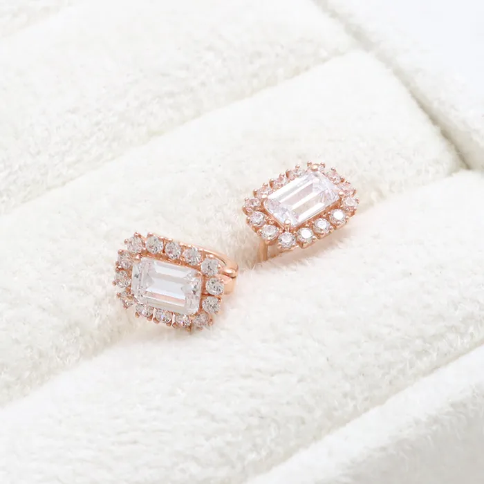 from J Shop Emerald Cut CZ Huggie Earrings Earrings