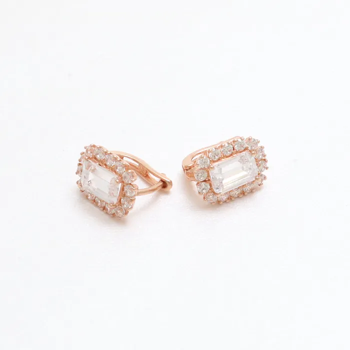 from J Shop Emerald Cut CZ Huggie Earrings Earrings