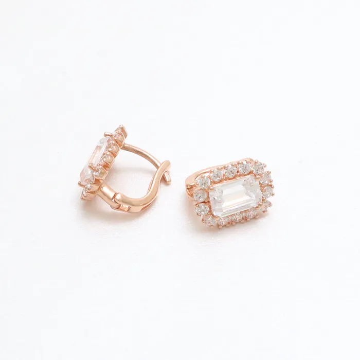 from J Shop Emerald Cut CZ Huggie Earrings Earrings