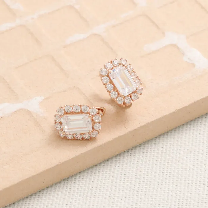 from J Shop Emerald Cut CZ Huggie Earrings Earrings