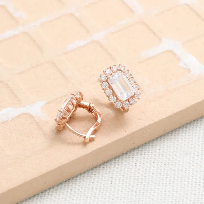 from J Shop Emerald Cut CZ Huggie Earrings Earrings
