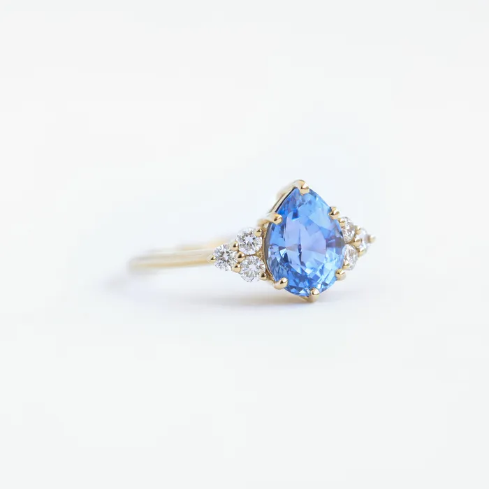Blue pear sapphire engagement ring Capucinne Rings