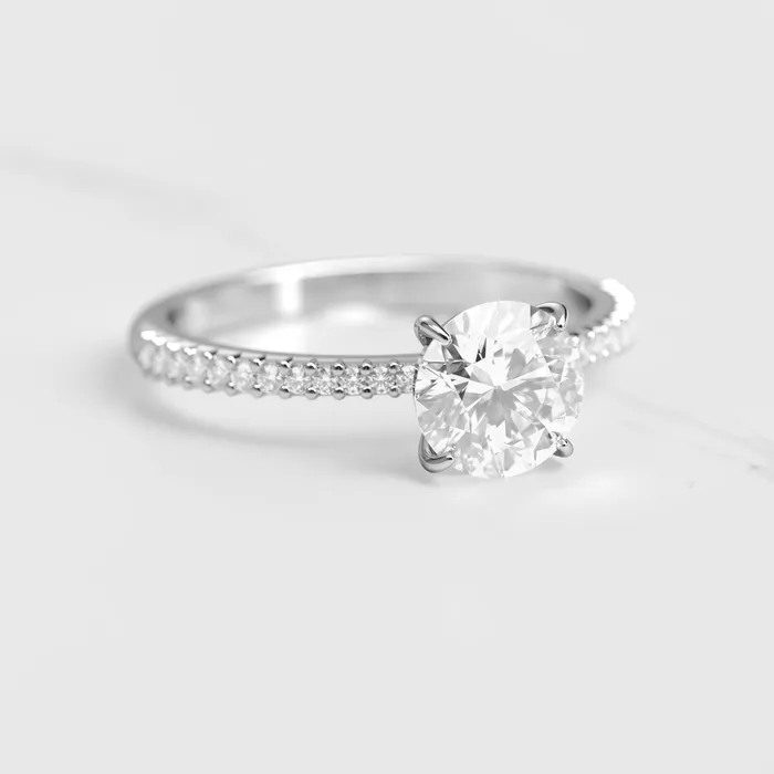 Capucinne Rings round moissanite ring with half eternity accent moissanites